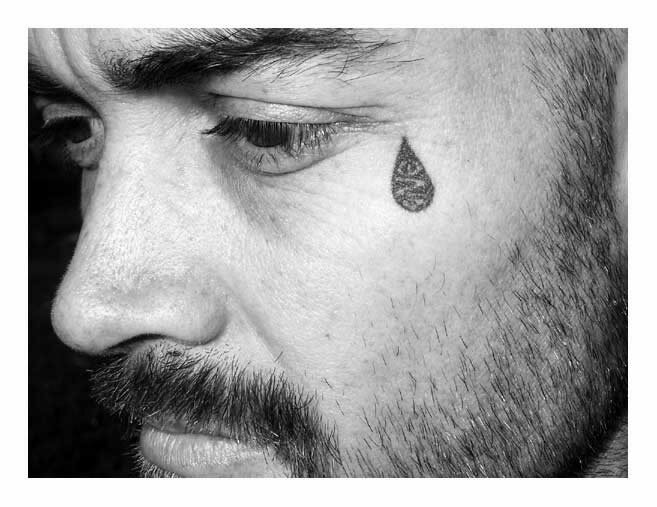 Though some are fairly universal, such as a teardrop tattooed near the eye 