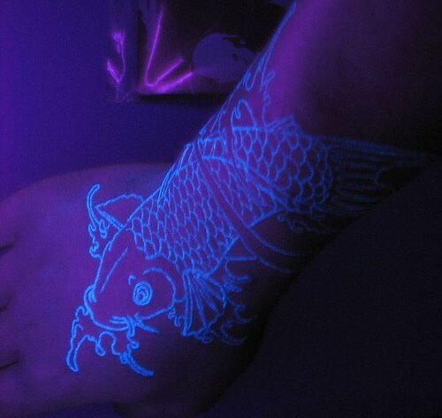 glow in dark tattoo. glow in the dark tattoo