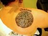 Celtic design on back with writing